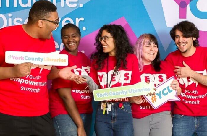 Feature Img Laughing Teens Pose In Front Of Backdrop YES 2019