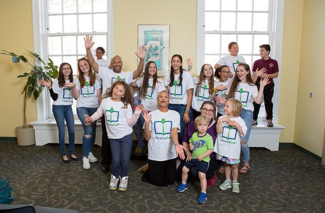 Group Photo With Librariesfeed Volunteers And President Robert Lambert