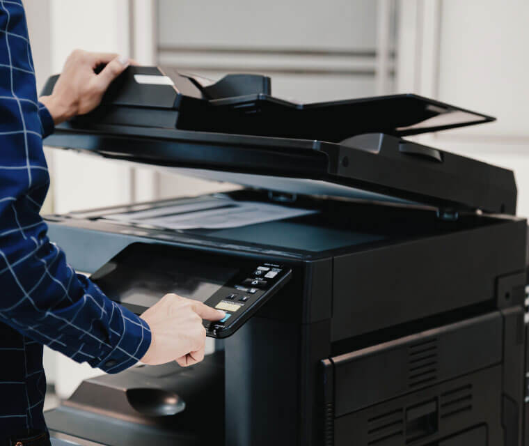 Man Using Library Copier