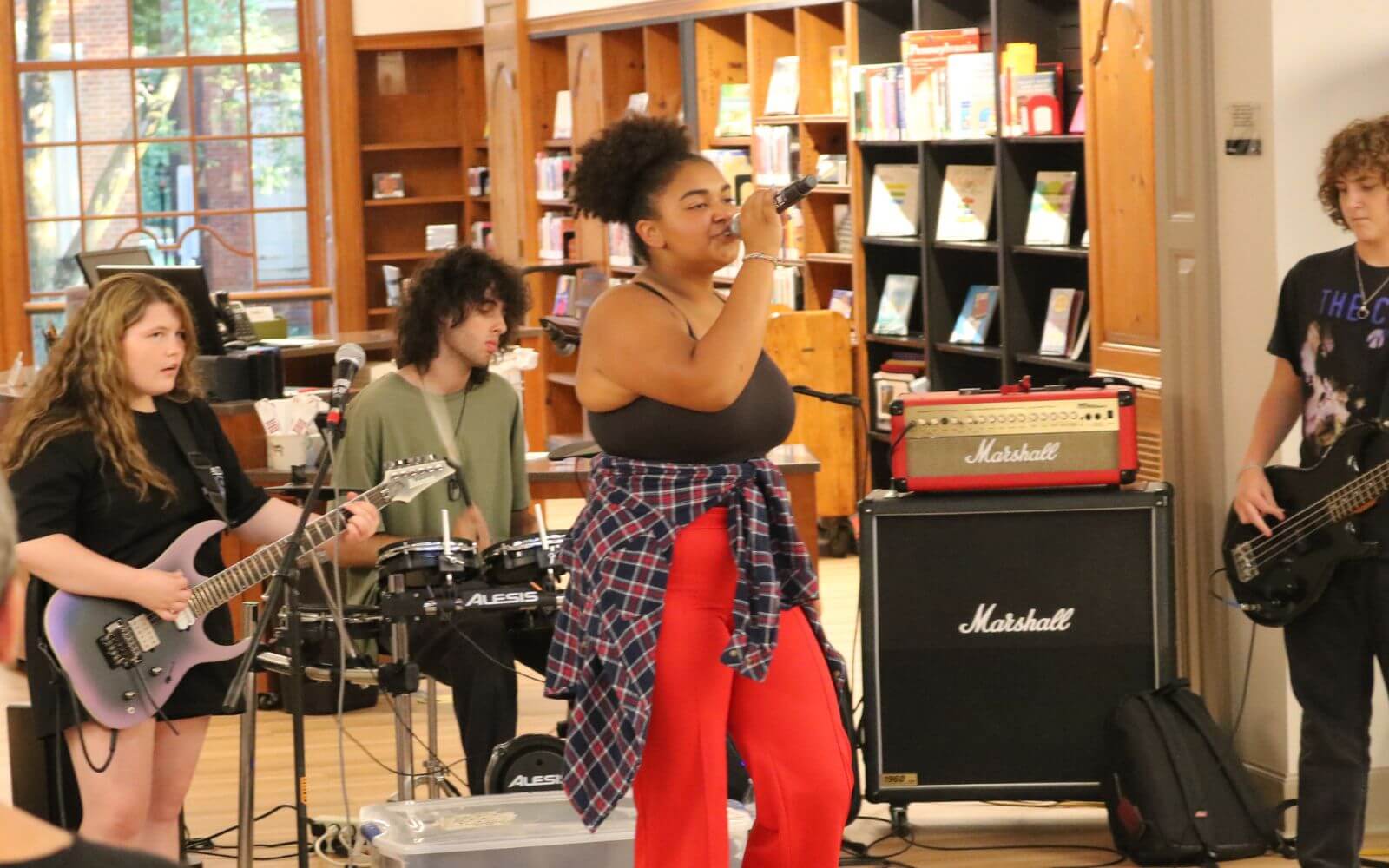 A pop band of young people gets a chance to perform for the public at Martin Library Cultural Jam
