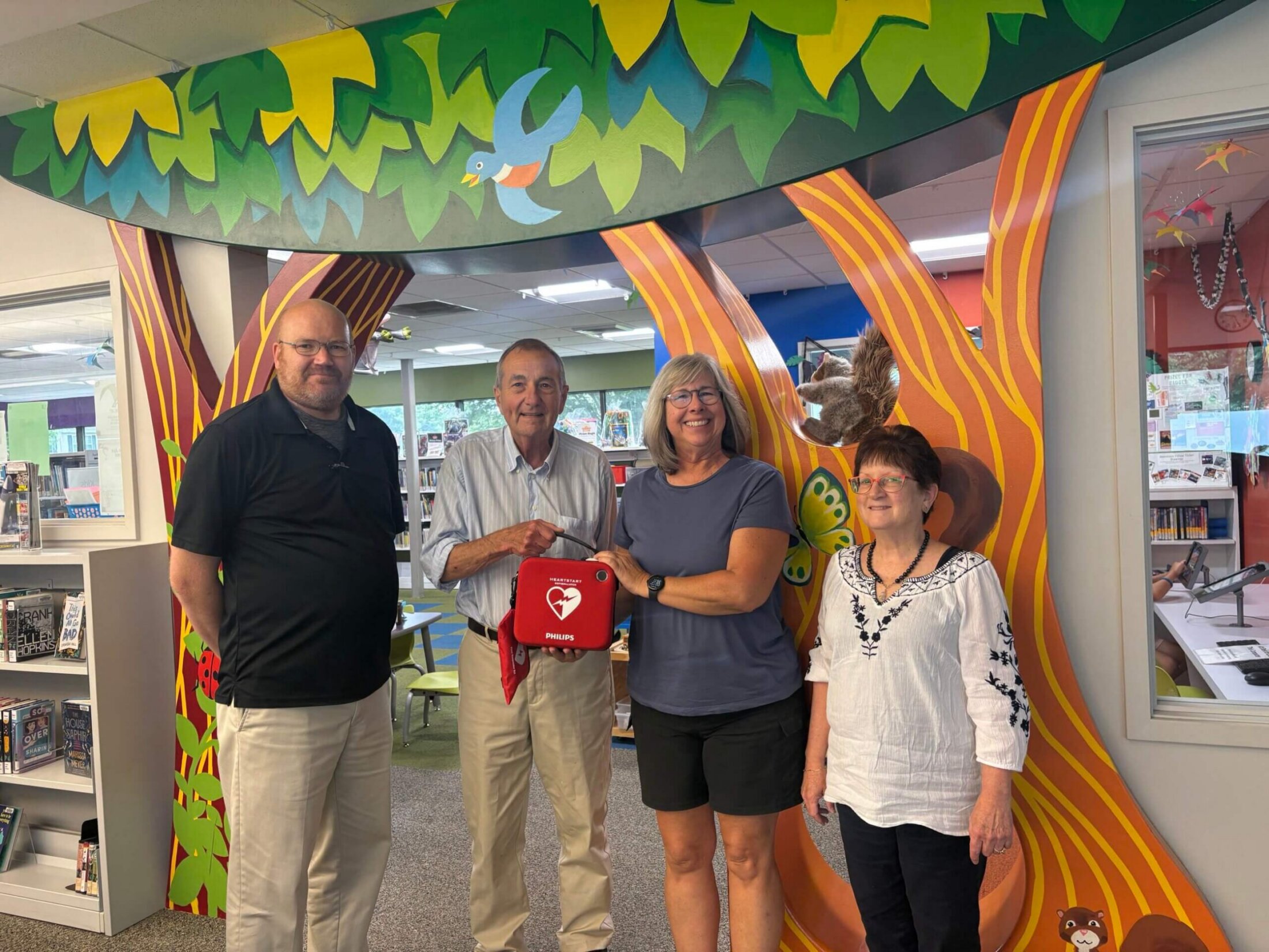 Left to right: Library Director Keith Greenawalt, Board President Rex Bickley, Board Member Lisa Richardson, Broad Vice President Jeanne Luksic